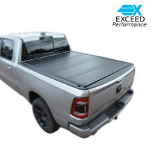 Exceed Hard Tri Fold Bed Cover |5'7" Bed RAM 1500 2WD/4WD 09+ (Kit)